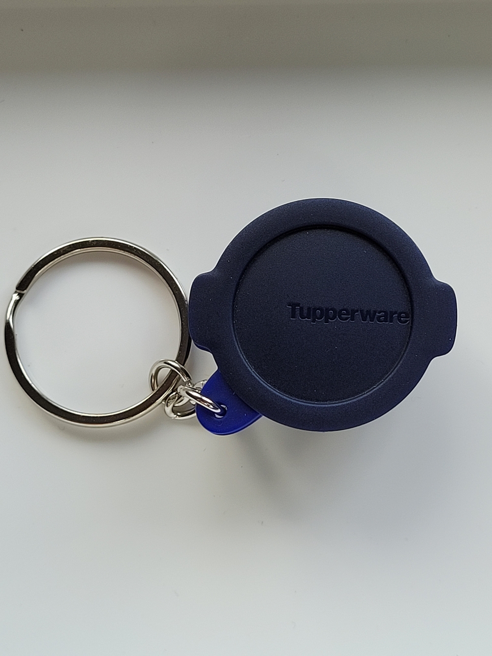 🎁 Free with purchase of $25+ / Tupperware Navy Silicone Keychain Token